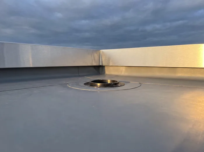 Crisp flat roof edge trim and outlet detail – Riverstone Roofing, Lincolnshire & Norfolk