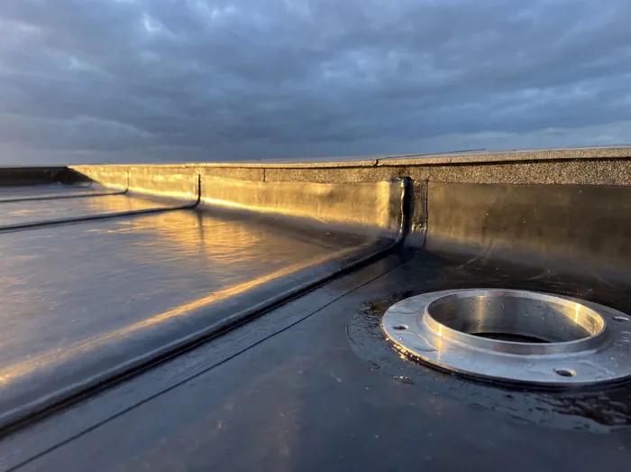 Repaired flat roof outlet detail – Riverstone Roofing, Lincolnshire & Norfolk